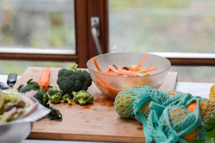 A cutting board with vegetables