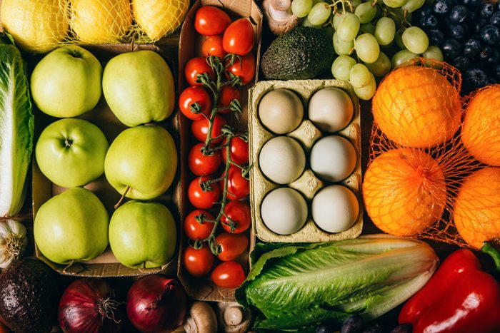Colorful Fresh Produce Flat Lay with Eggs, Vegetables and Fruits